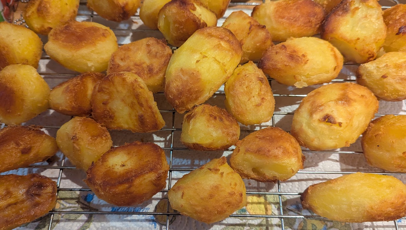 AI Roast Potatoes cooling on a wire tray